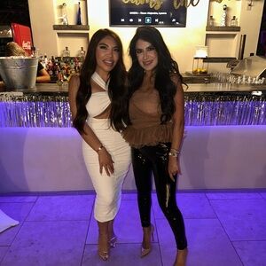 Chic White Dress and Stylish Black Pants Outfit